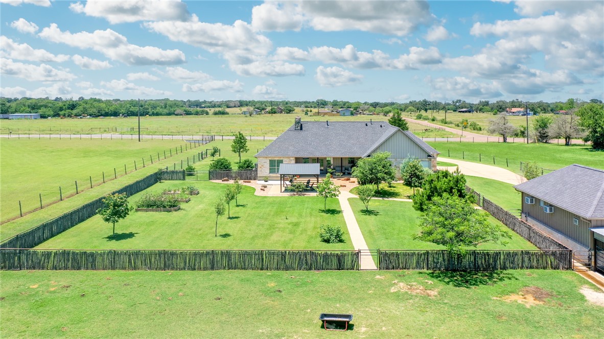 9652 Locke Road Bryan, TX 77808 - Photo 47 of 50 AERIAL OF HOME AND STABLE/BARN AREA
