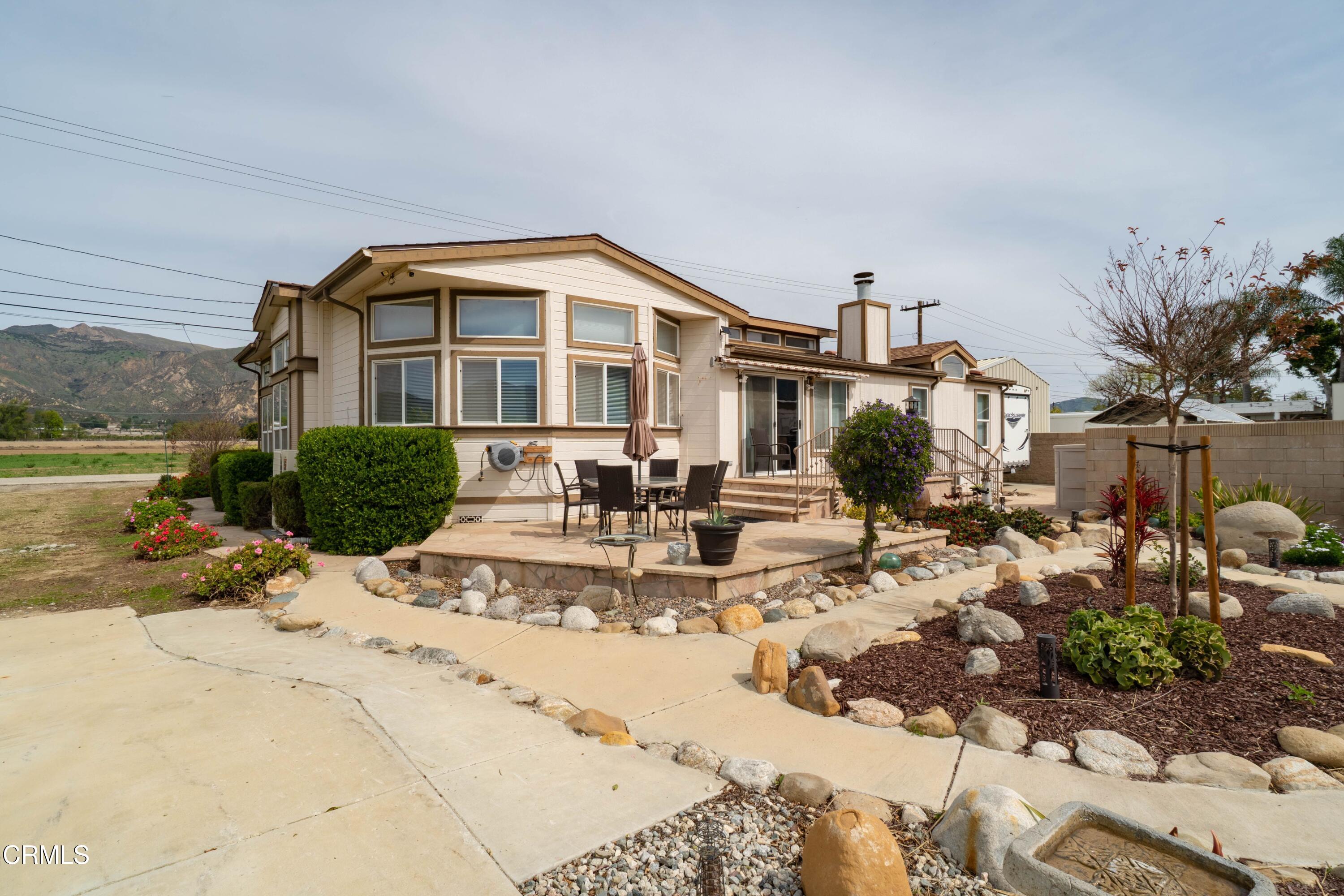 3760 Howe Road Fillmore, CA 93015 - Photo 25 of 32 a view of a house with swimming pool and sitting area