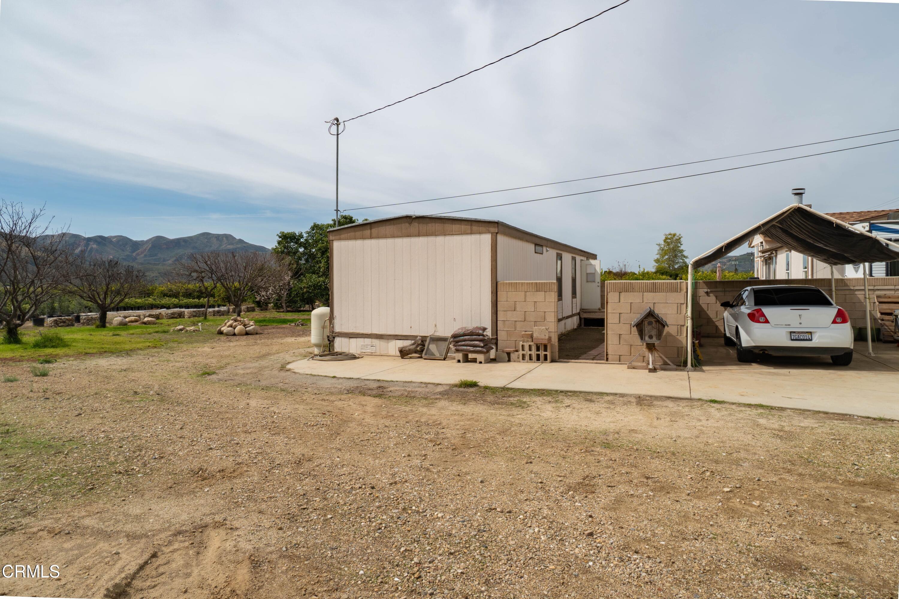 3760 Howe Road Fillmore, CA 93015 - Photo 28 of 32 a car parked on the side of the road