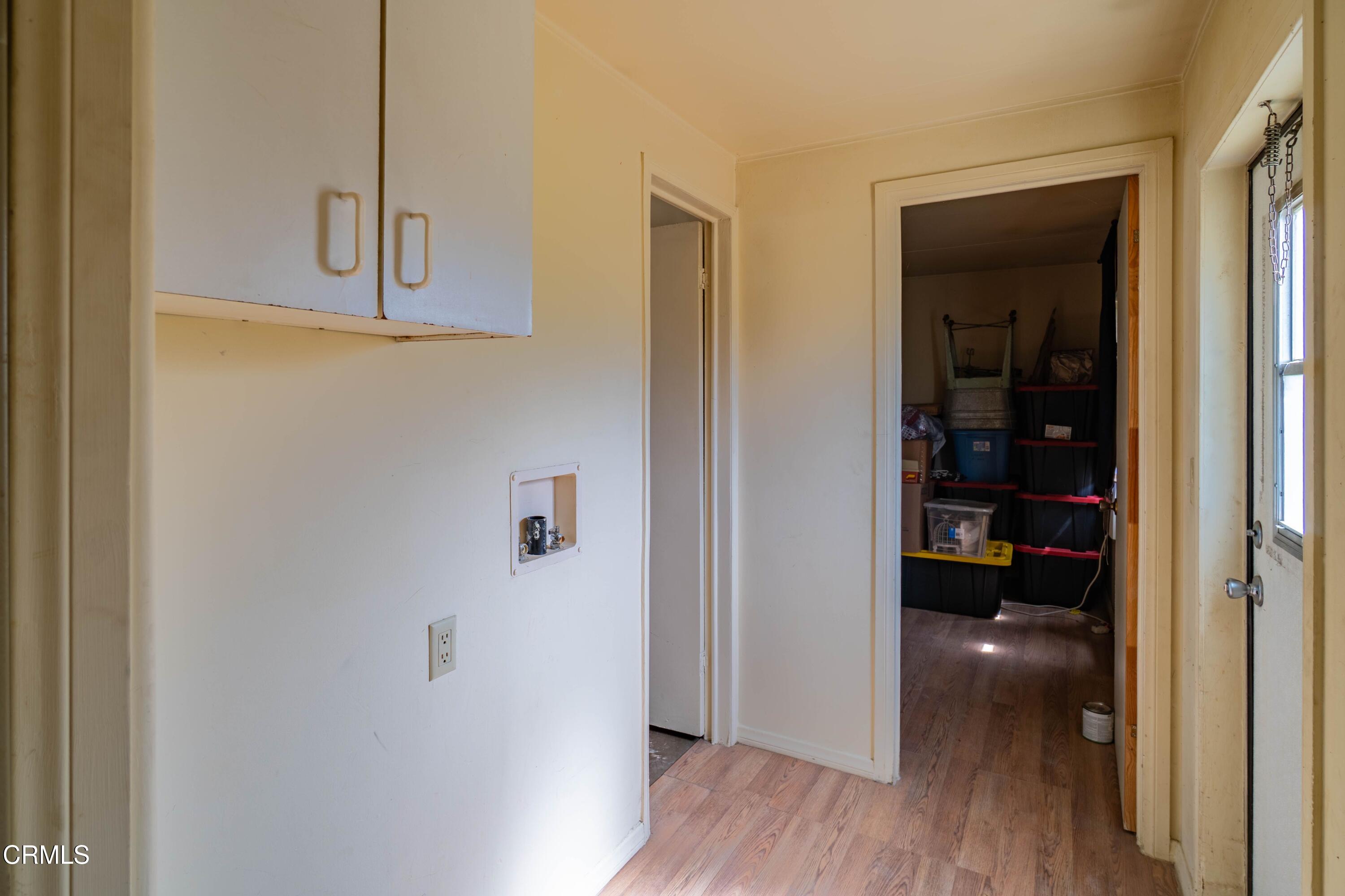 3760 Howe Road Fillmore, CA 93015 - Photo 32 of 32 a view of a hallway with wooden floor and closet