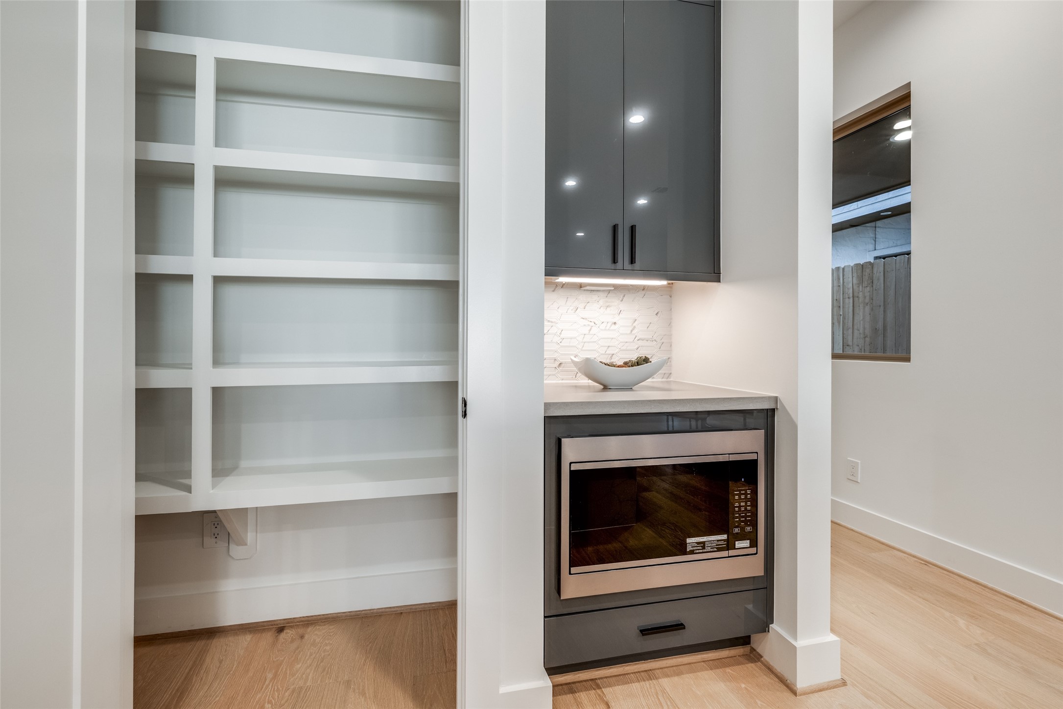 2410 Quenby Street Houston, TX 77005 - Photo 15 of 42 a living room with furniture and a fireplace
