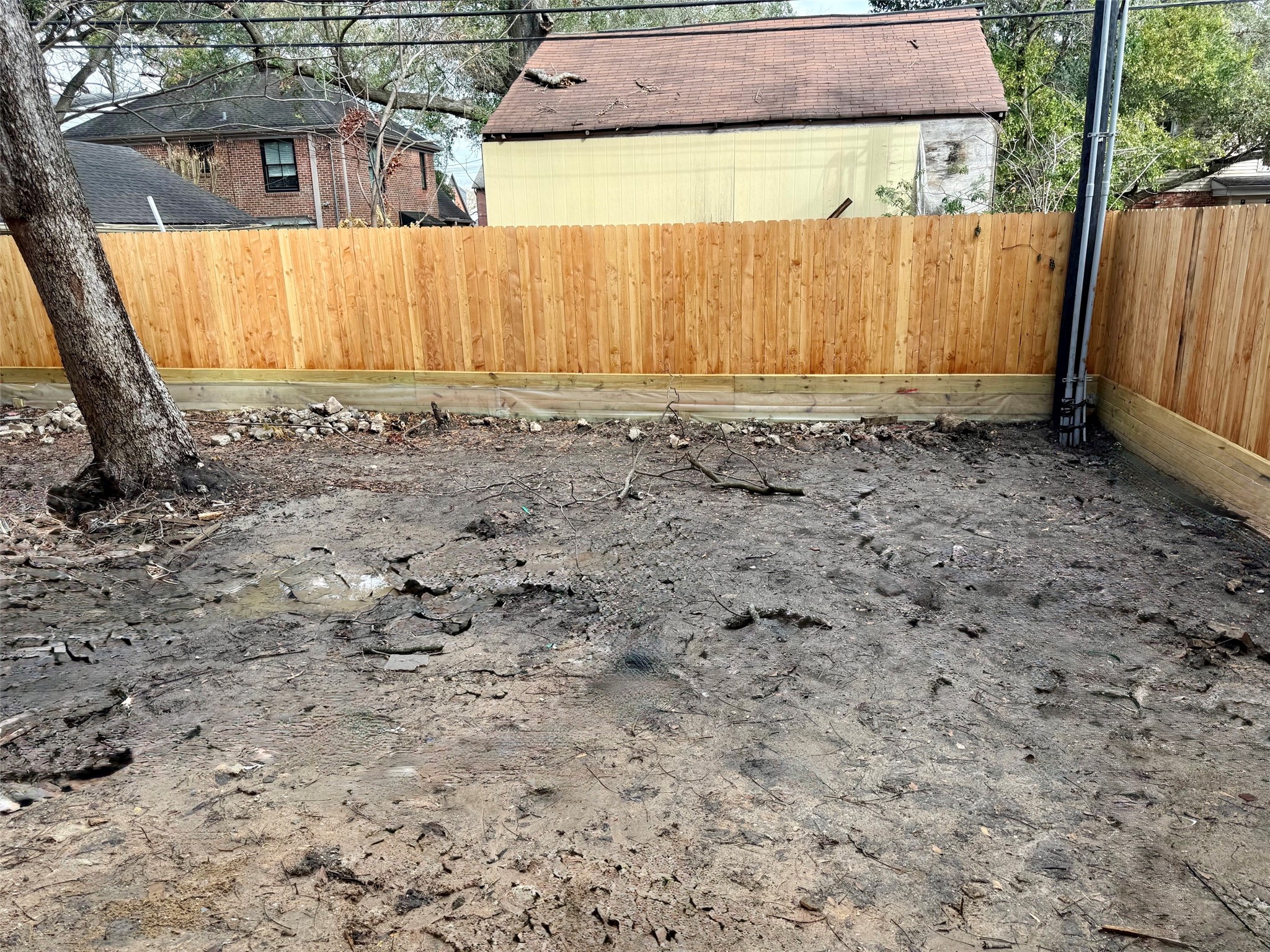 2410 Quenby Street Houston, TX 77005 - Photo 42 of 42 a view of a small house with a yard