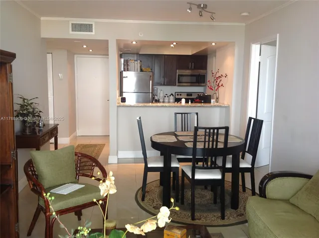 a view of a dining room with furniture