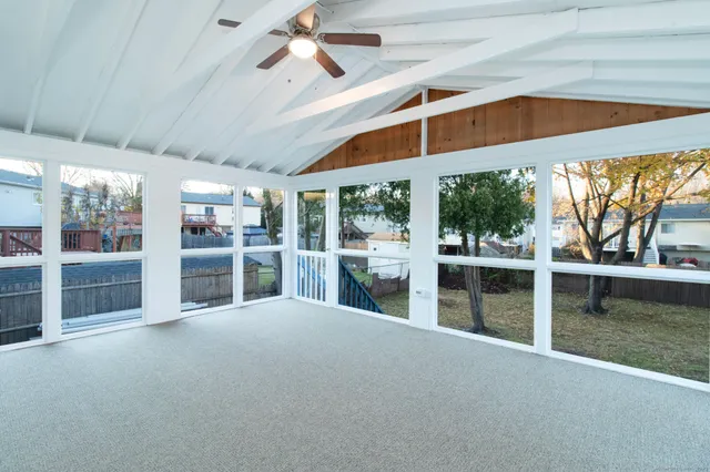 a view of an empty room with a yard