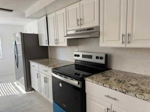 a view of a house with a patio