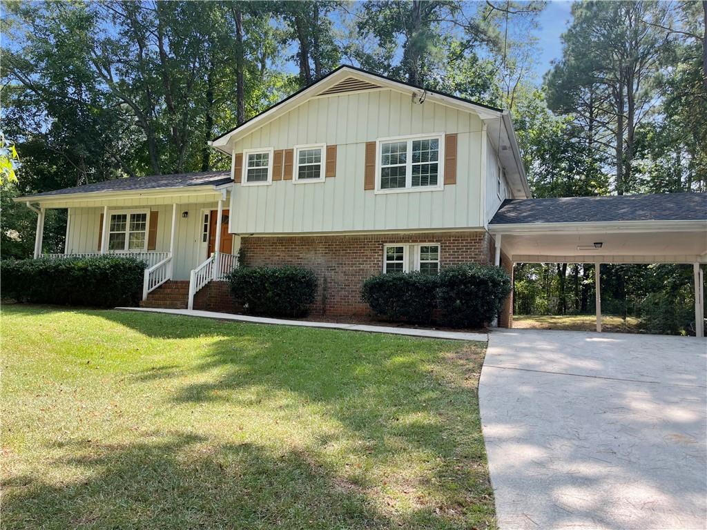 4333 Sterling Forest Drive Decatur, GA 30034 - Photo 1 of 1 a front view of a house with garden