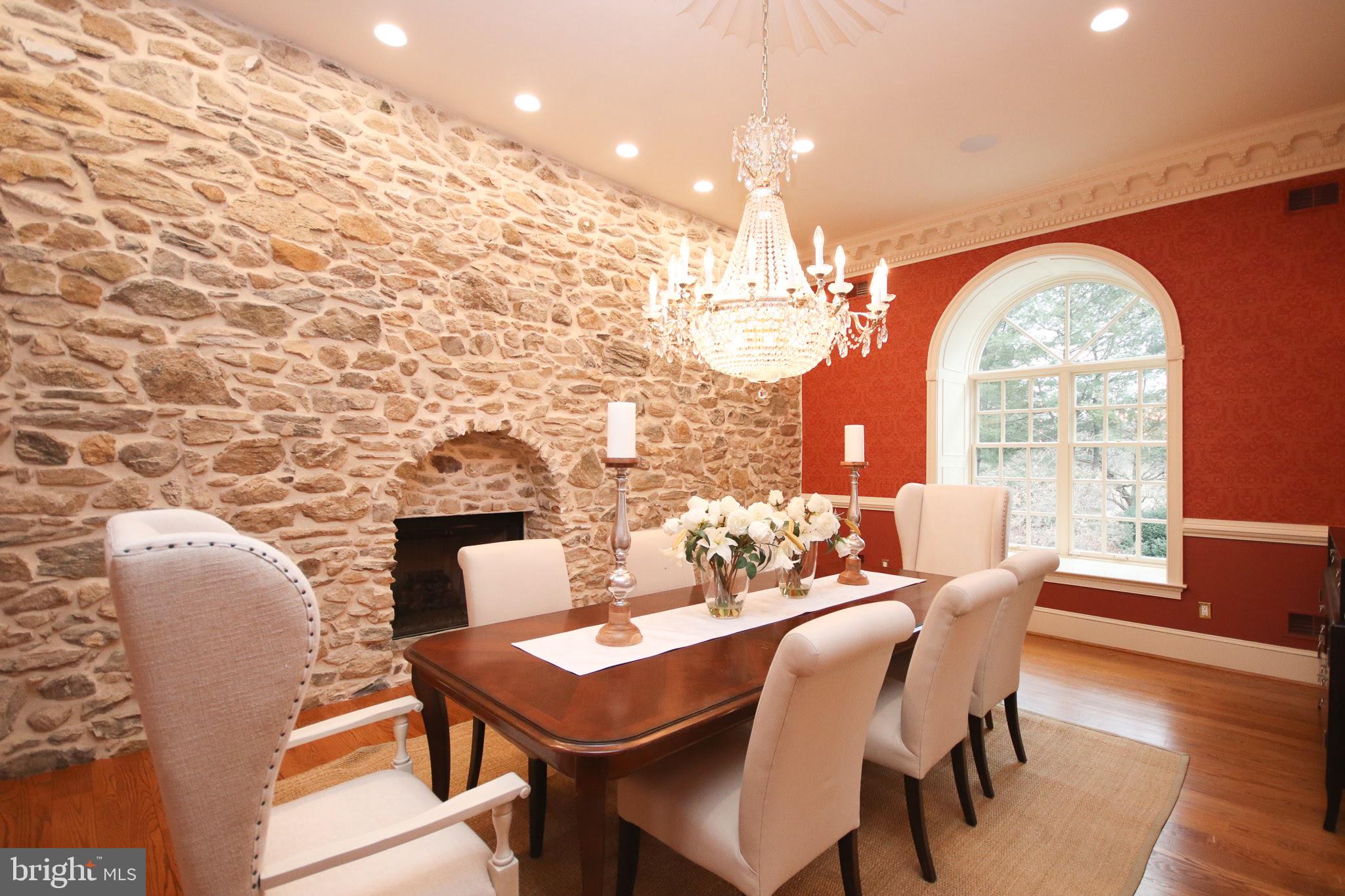 400 Inveraray Villanova, PA 19085 - Photo 15 of 61 Formal Dining room with original stone wall/gas FP