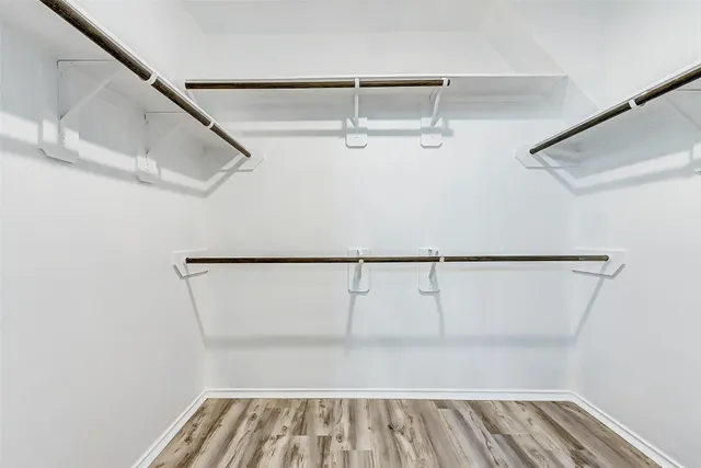 a view of a room with racks on the wall