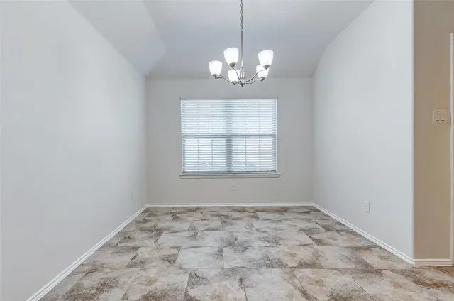 en empty room with windows