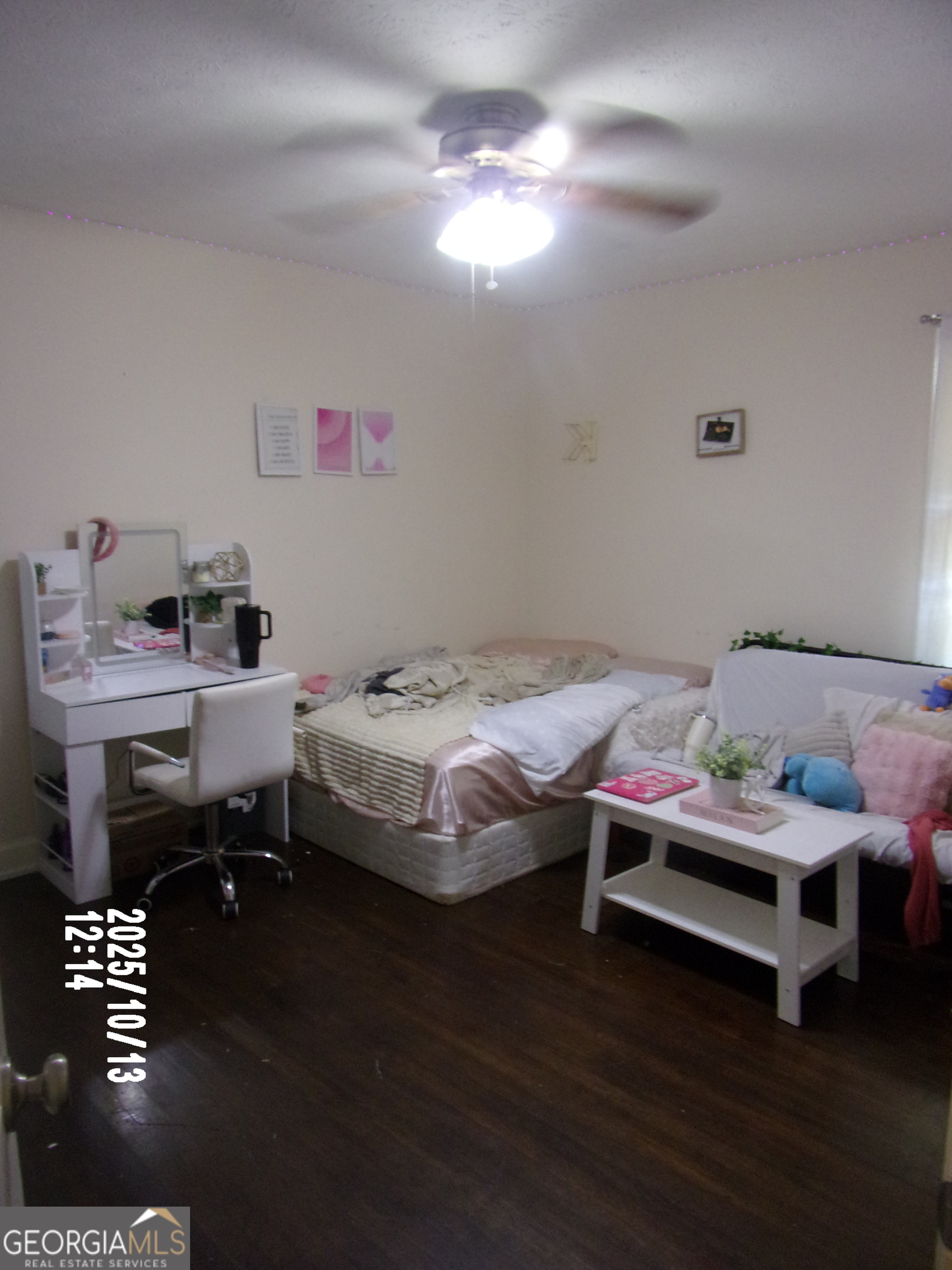 133 Springdale Drive Thomaston, GA 30286 - Photo 13 of 40 a bedroom with a bed and a table in it