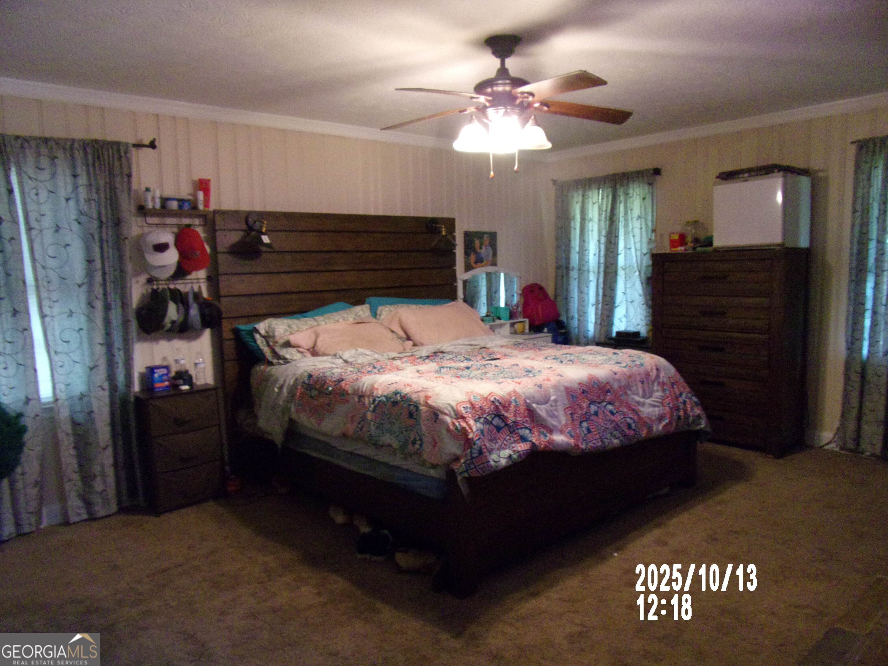 133 Springdale Drive Thomaston, GA 30286 - Photo 22 of 40 a bed sitting in a bedroom and closet