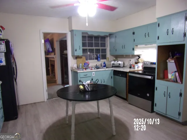 a kitchen with a breakfast area