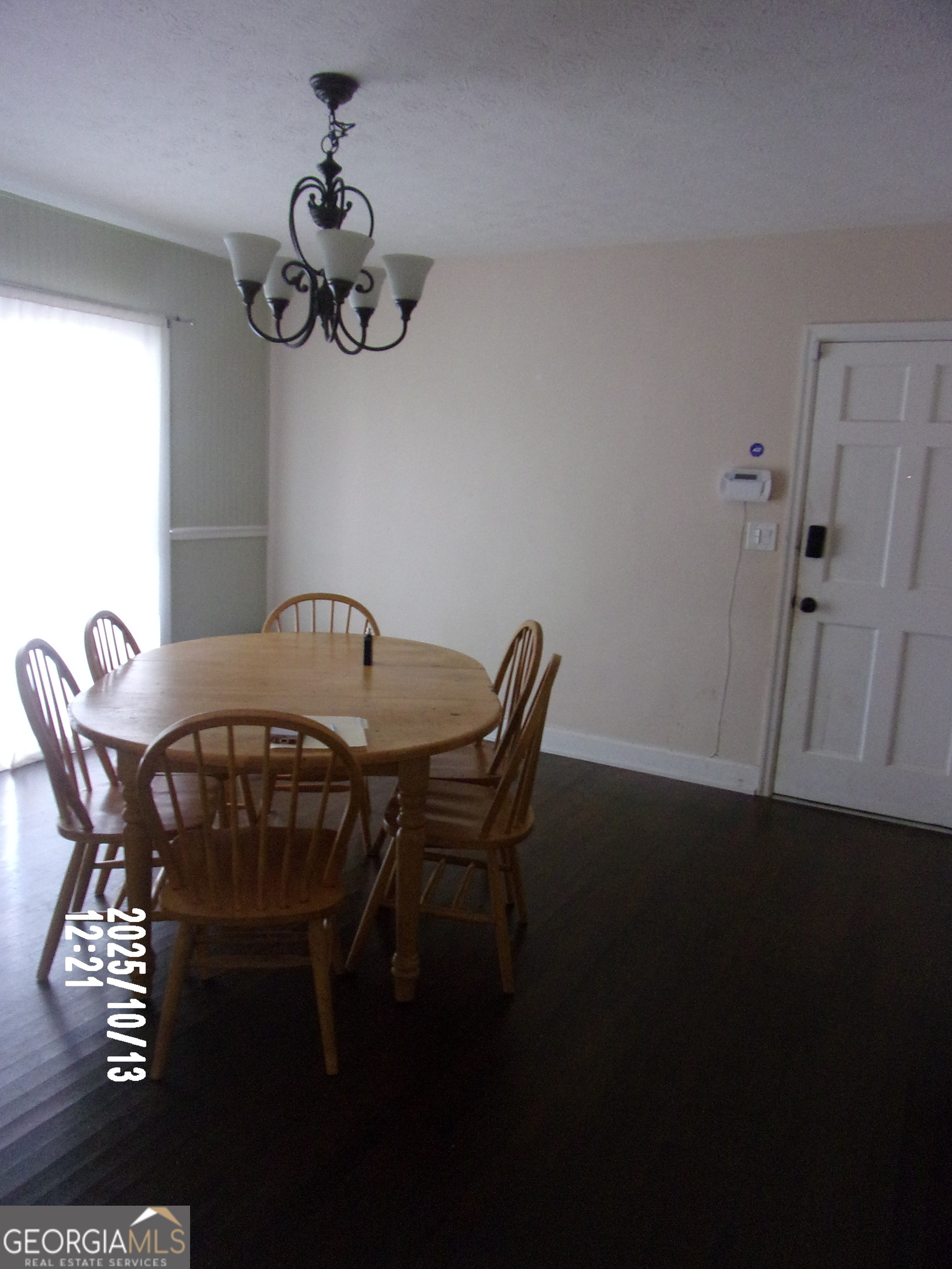 133 Springdale Drive Thomaston, GA 30286 - Photo 31 of 40 a view of a dining room with furniture and chandelier
