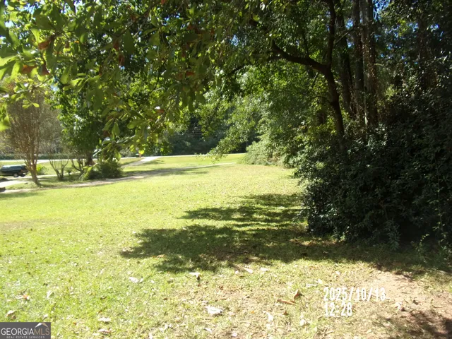 a view of house with outdoor space