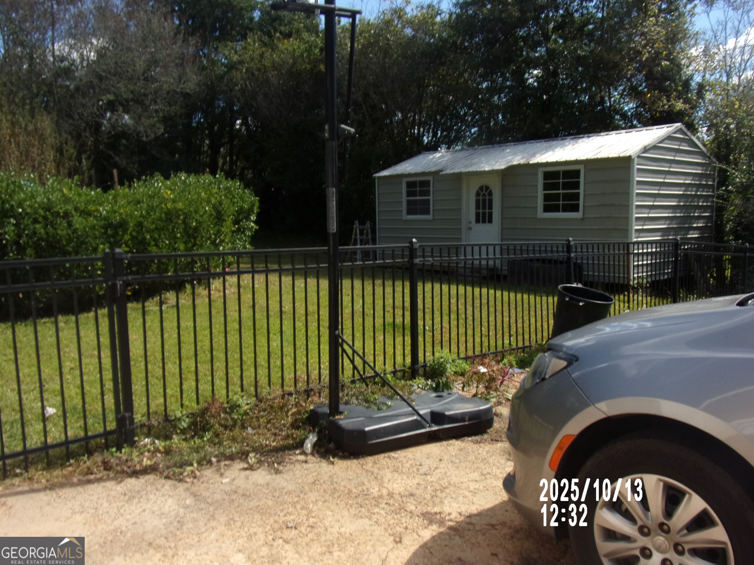 133 Springdale Drive Thomaston, GA 30286 - Photo 38 of 40 a view of a house with backyard and sitting area