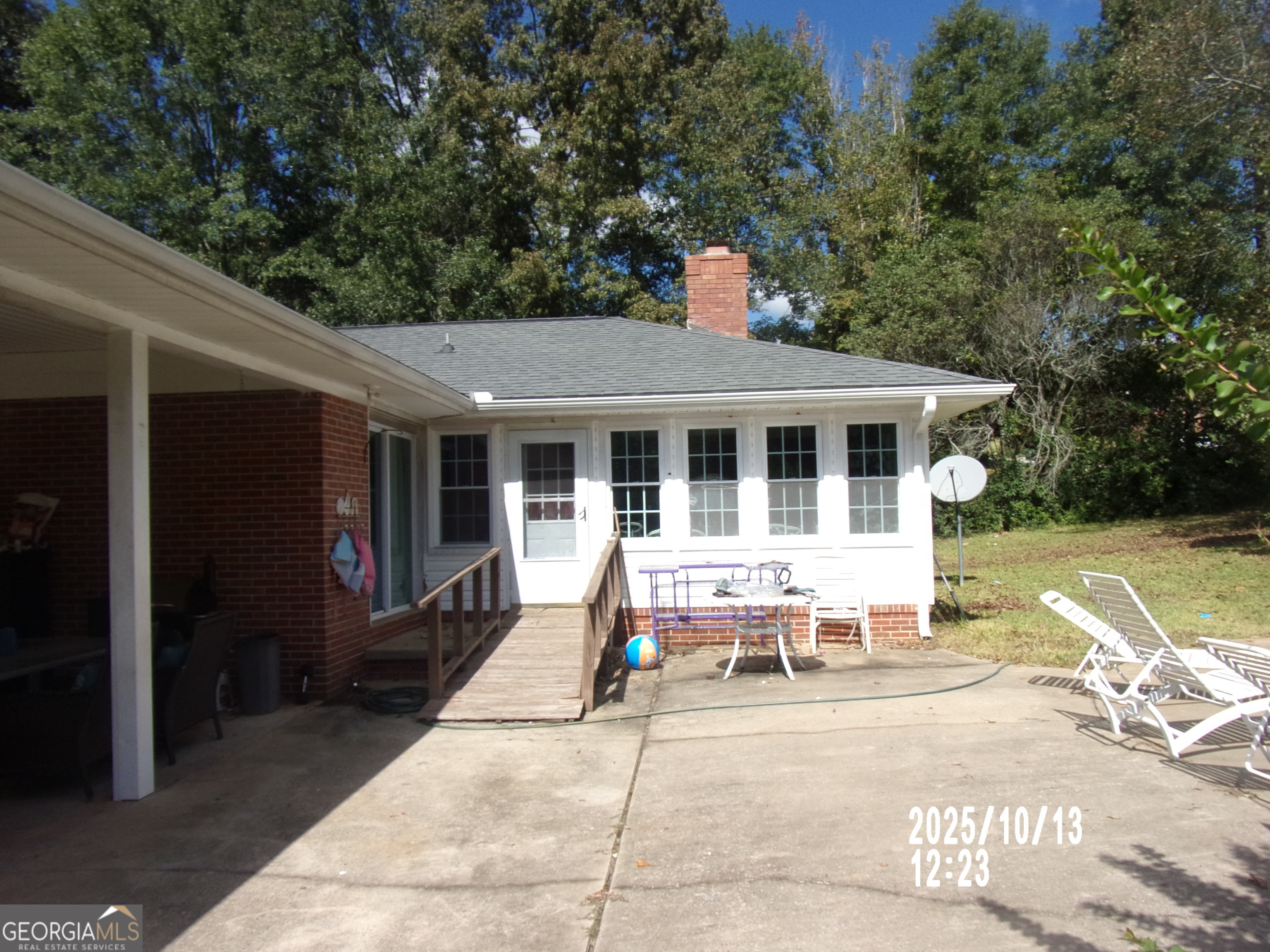 133 Springdale Drive Thomaston, GA 30286 - Photo 6 of 40 a house view with a sitting space and garden space