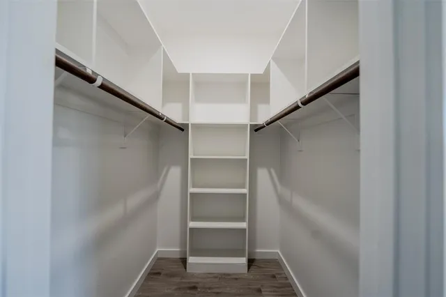 a view of an empty walk in closet