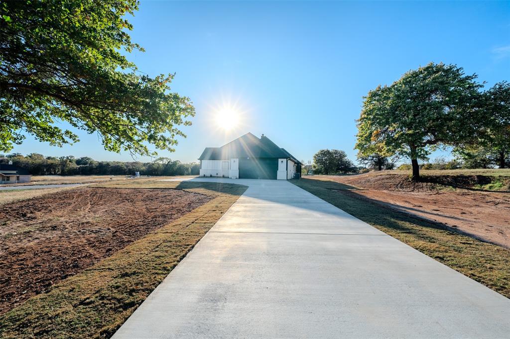 200 Kilkenny Road Poolville, TX 76487 - Photo 24 of 30 Long paved driveway
