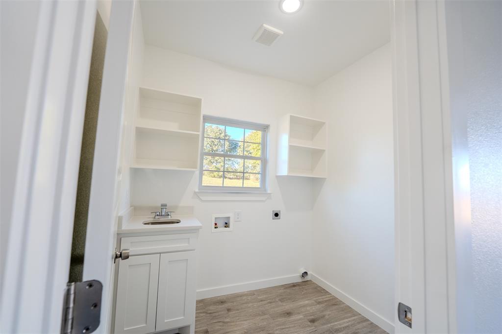 200 Kilkenny Road Poolville, TX 76487 - Photo 28 of 36 a view of a room that has a window in it