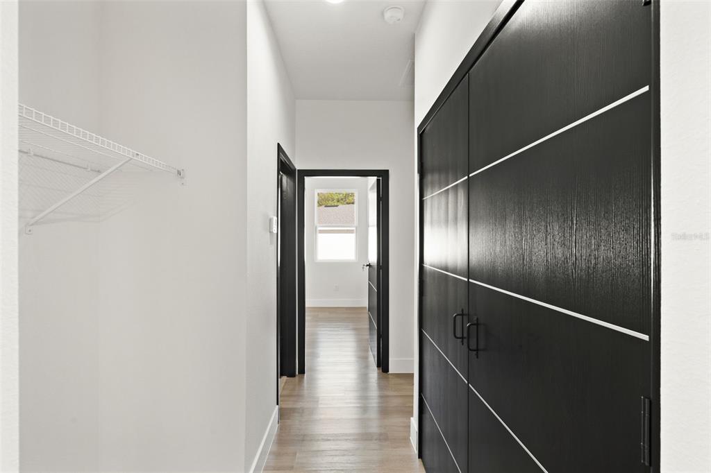 11810 North Providence Way Citrus Springs, FL 34433 - Photo 26 of 53 a view of hallway with wooden floor