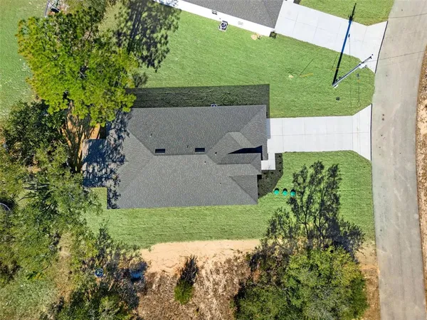 a view of under a house with a yard