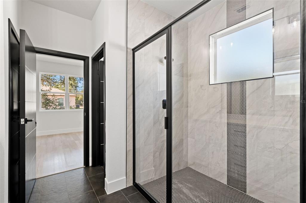 11810 North Providence Way Citrus Springs, FL 34433 - Photo 41 of 53 a bathroom with a mirror