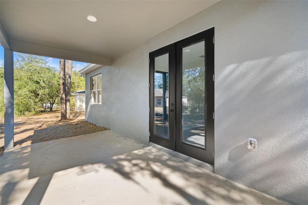 11810 North Providence Way Citrus Springs, FL 34433 - Photo 45 of 53 a view of a room that has a large window