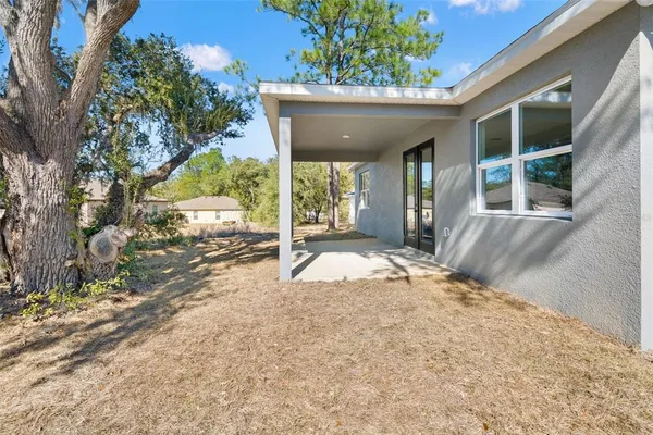 a house with trees in front of it