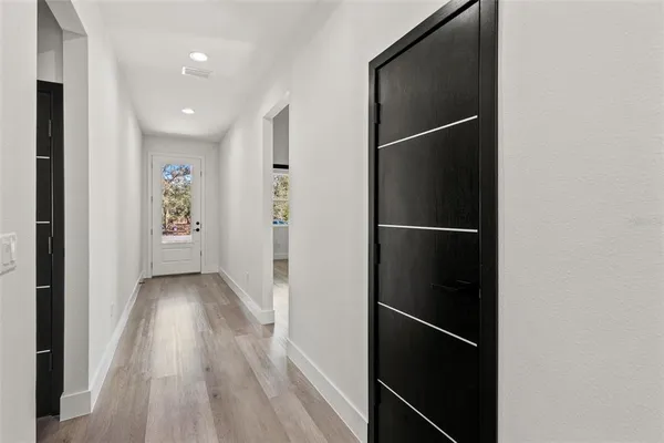 a view of hallway with walk in closet