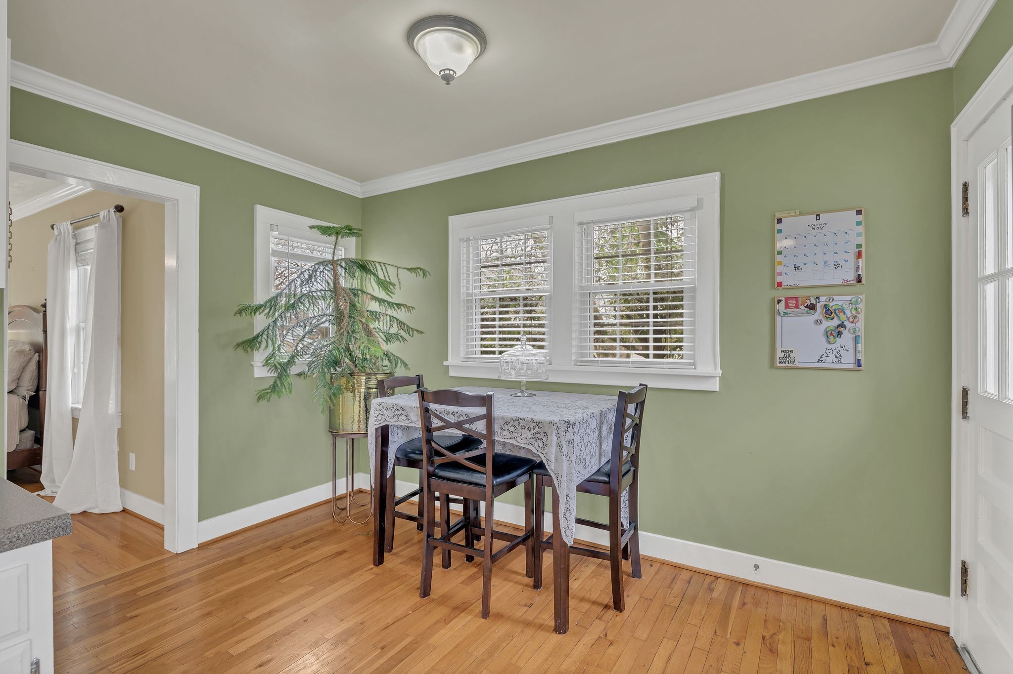 109 Audubon Road Shelbyville, TN 37160 - Photo 18 of 34 a view of a dining room with furniture and wooden floor