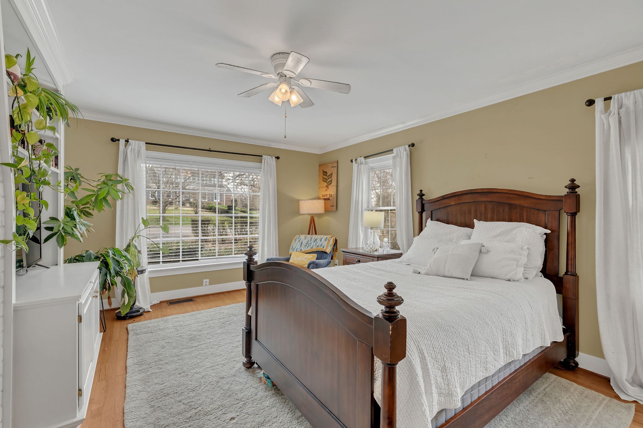 109 Audubon Road Shelbyville, TN 37160 - Photo 19 of 34 a bed room with a bed and a chandelier