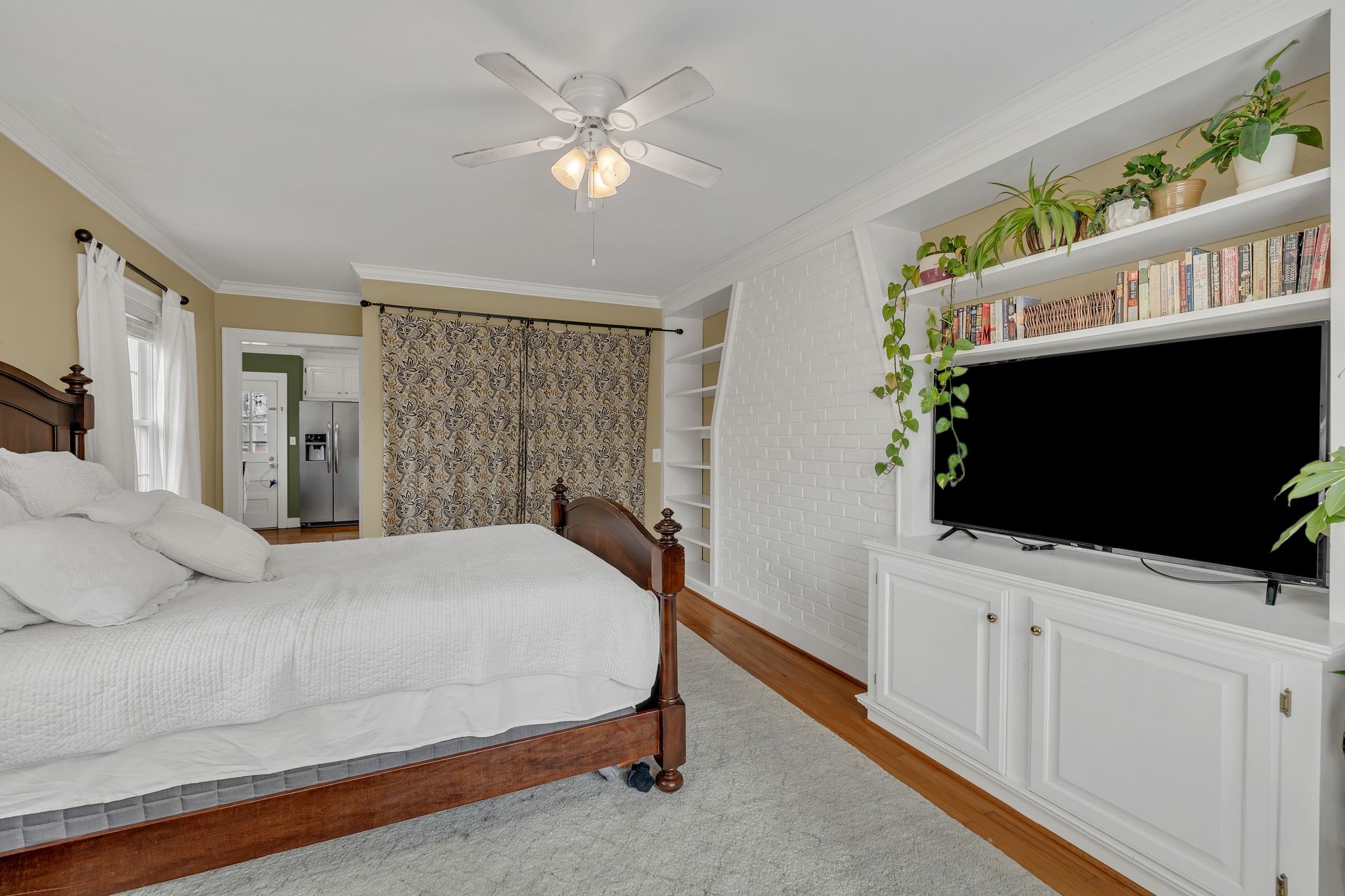 109 Audubon Road Shelbyville, TN 37160 - Photo 21 of 34 a bedroom with a bed and a flat screen tv