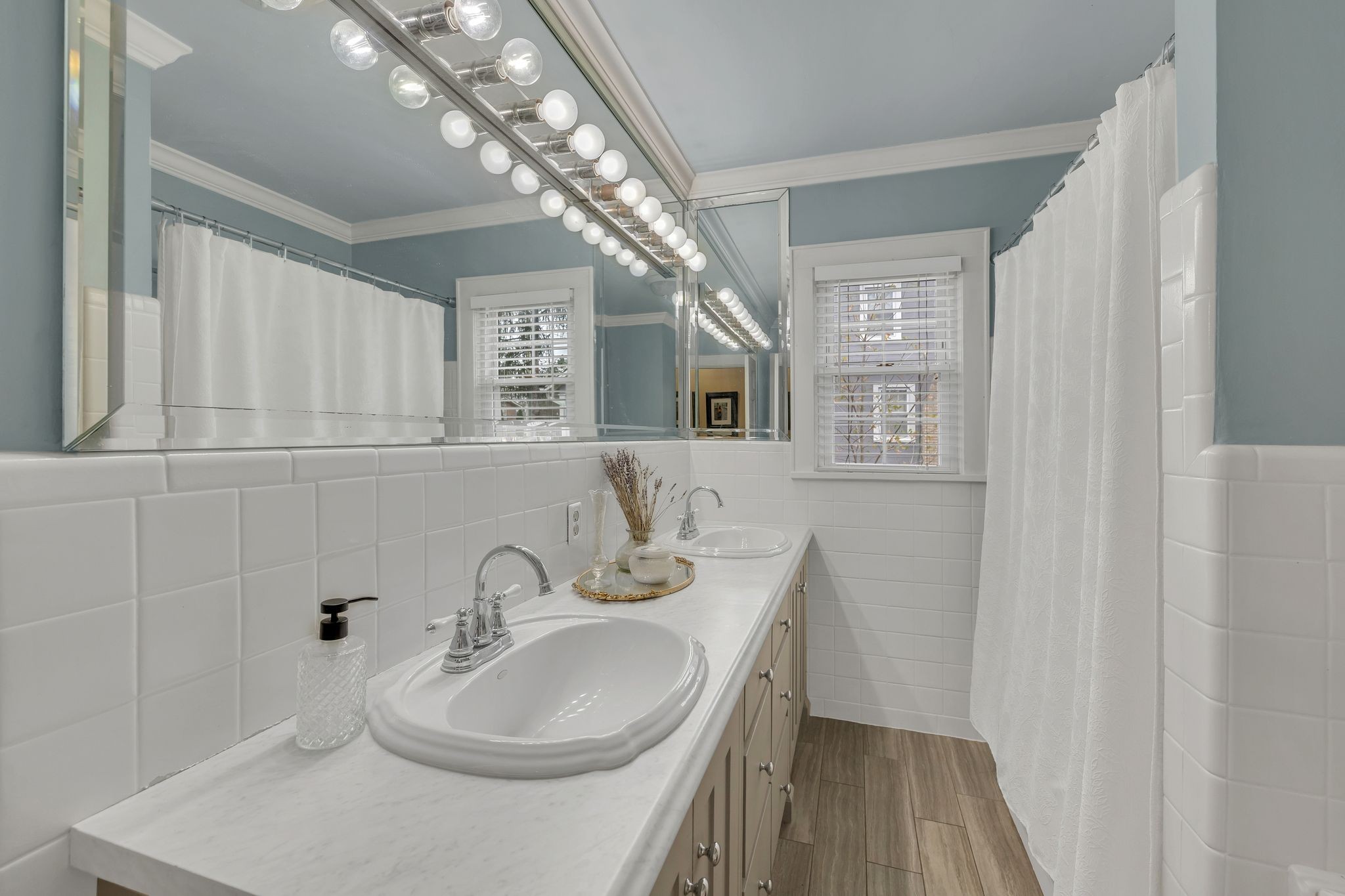 109 Audubon Road Shelbyville, TN 37160 - Photo 26 of 34 a bathroom with a sink and a mirror