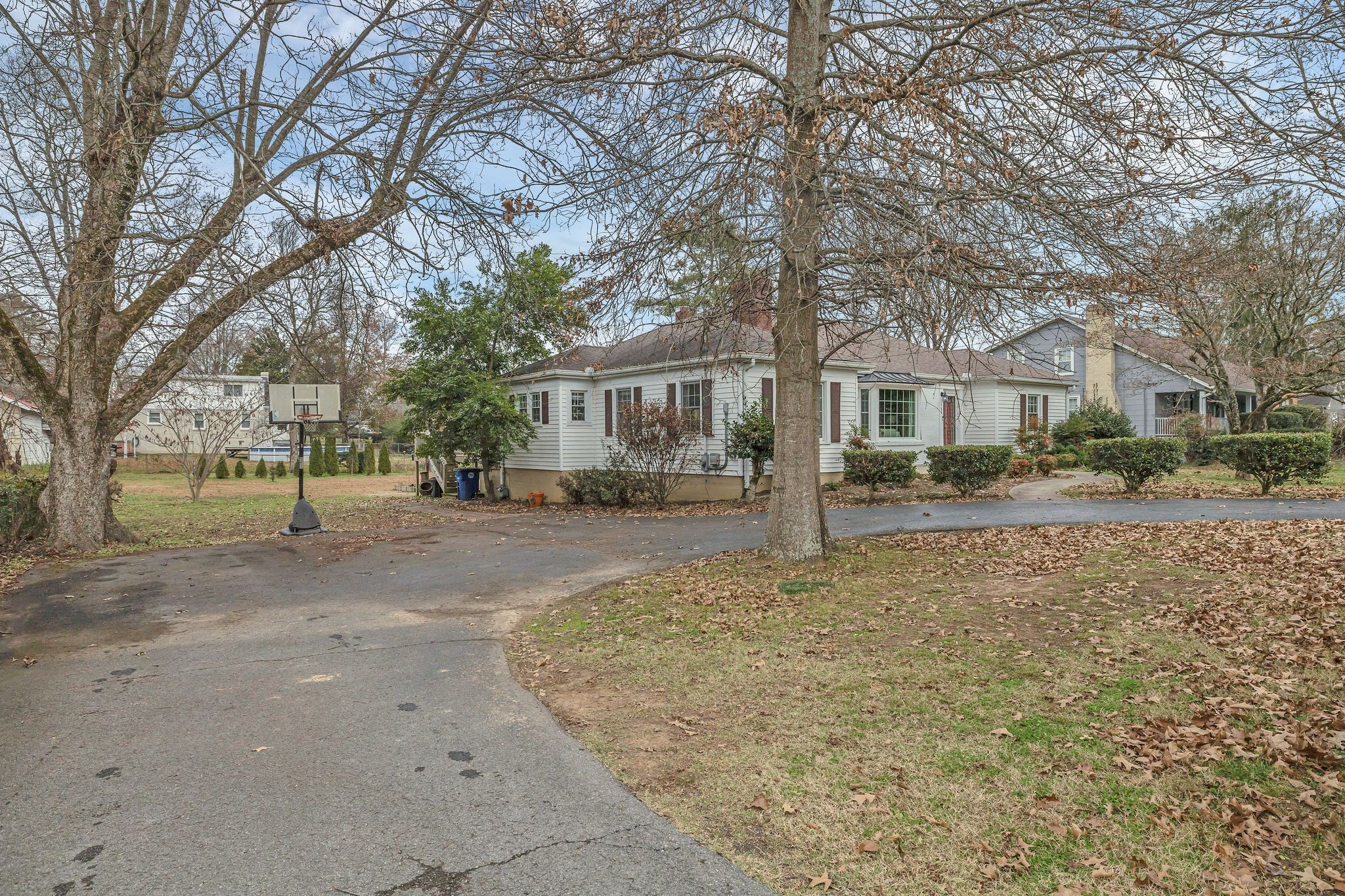 109 Audubon Road Shelbyville, TN 37160 - Photo 6 of 34 a front view of a house with a yard and trees