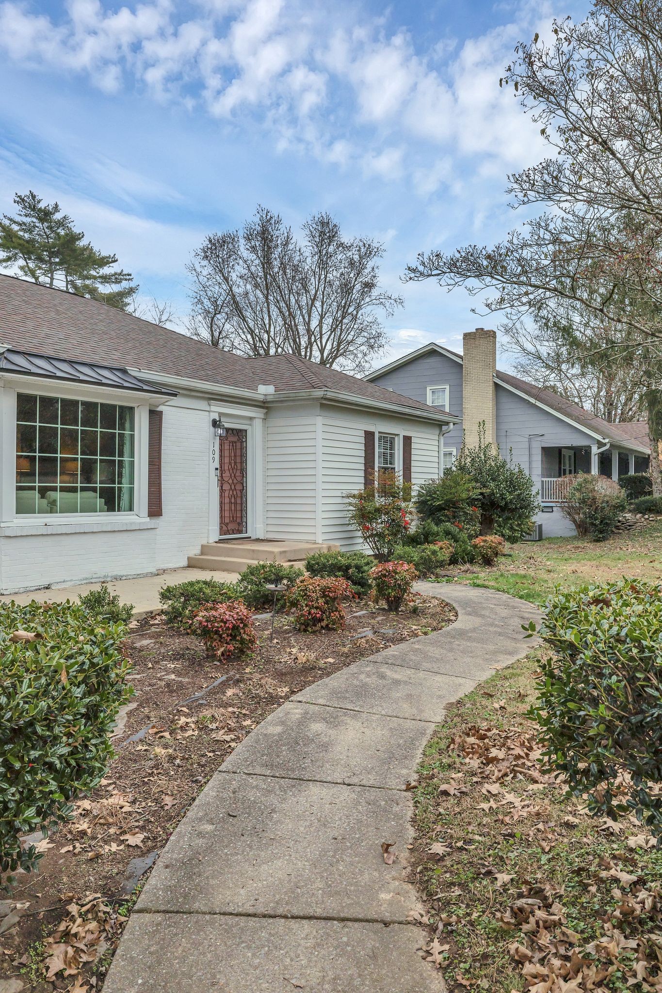 109 Audubon Road Shelbyville, TN 37160 - Photo 7 of 34 a front view of a house with a yard