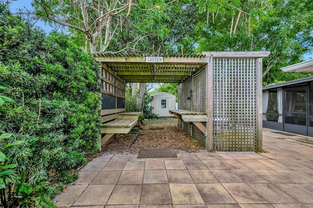 4478 Coco Ridge Circle Sarasota, FL 34233 - Photo 58 of 85 a backyard of a house with lots of green space