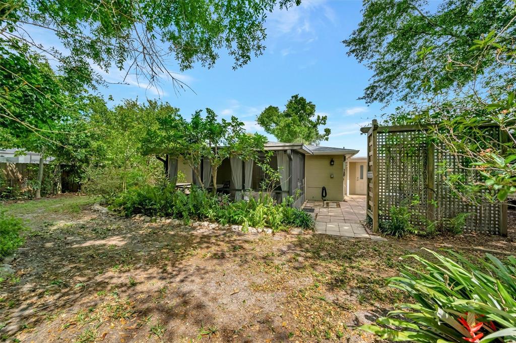 4478 Coco Ridge Circle Sarasota, FL 34233 - Photo 74 of 85 front view of a house with a yard