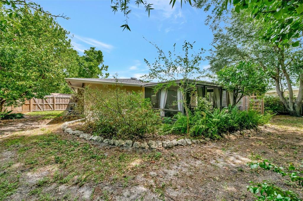 4478 Coco Ridge Circle Sarasota, FL 34233 - Photo 76 of 85 a view of a house with a garden
