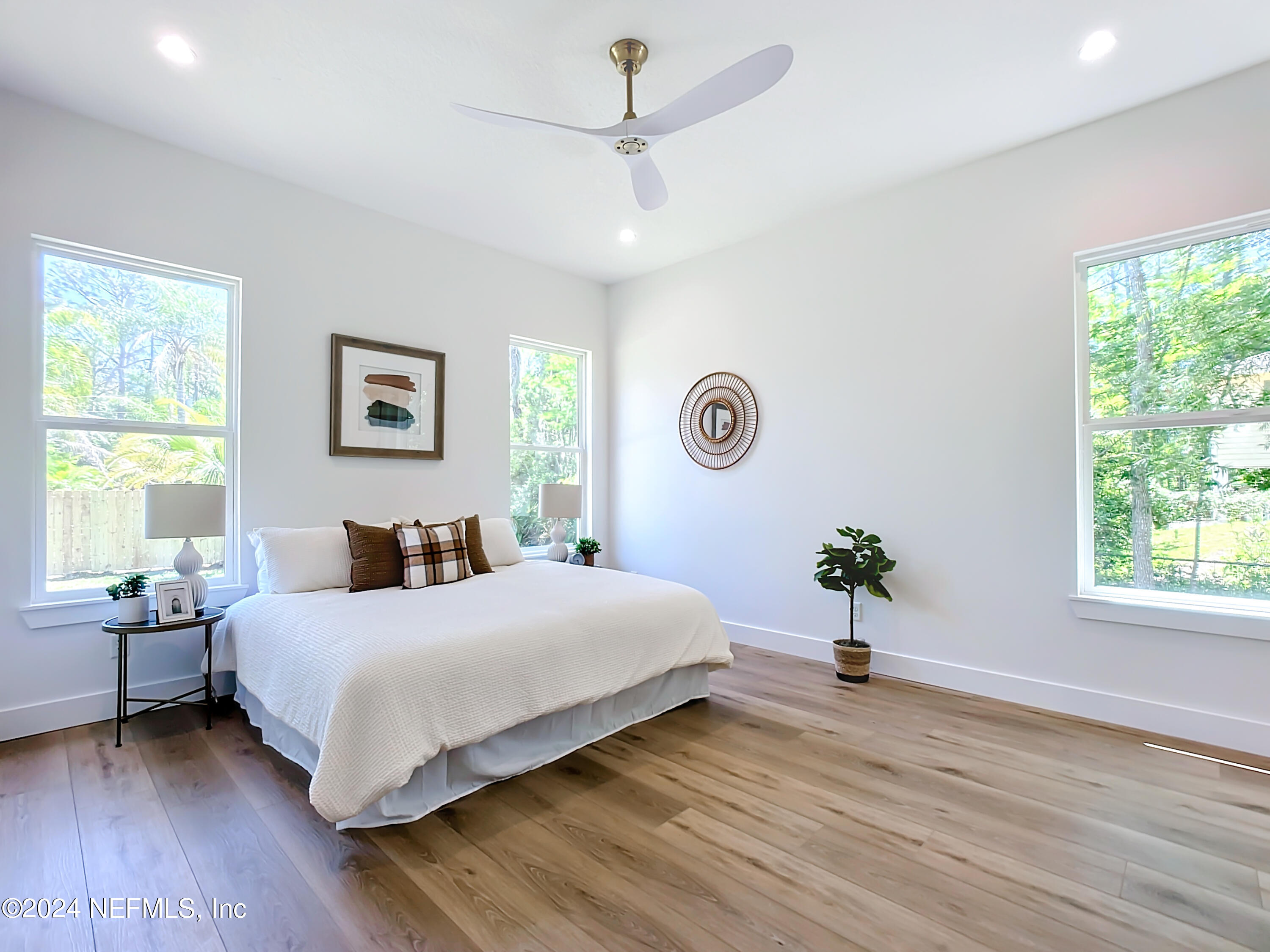 2909 Brougham Jacksonville, FL 32246 - Photo 16 of 46 a bedroom with a bed and window