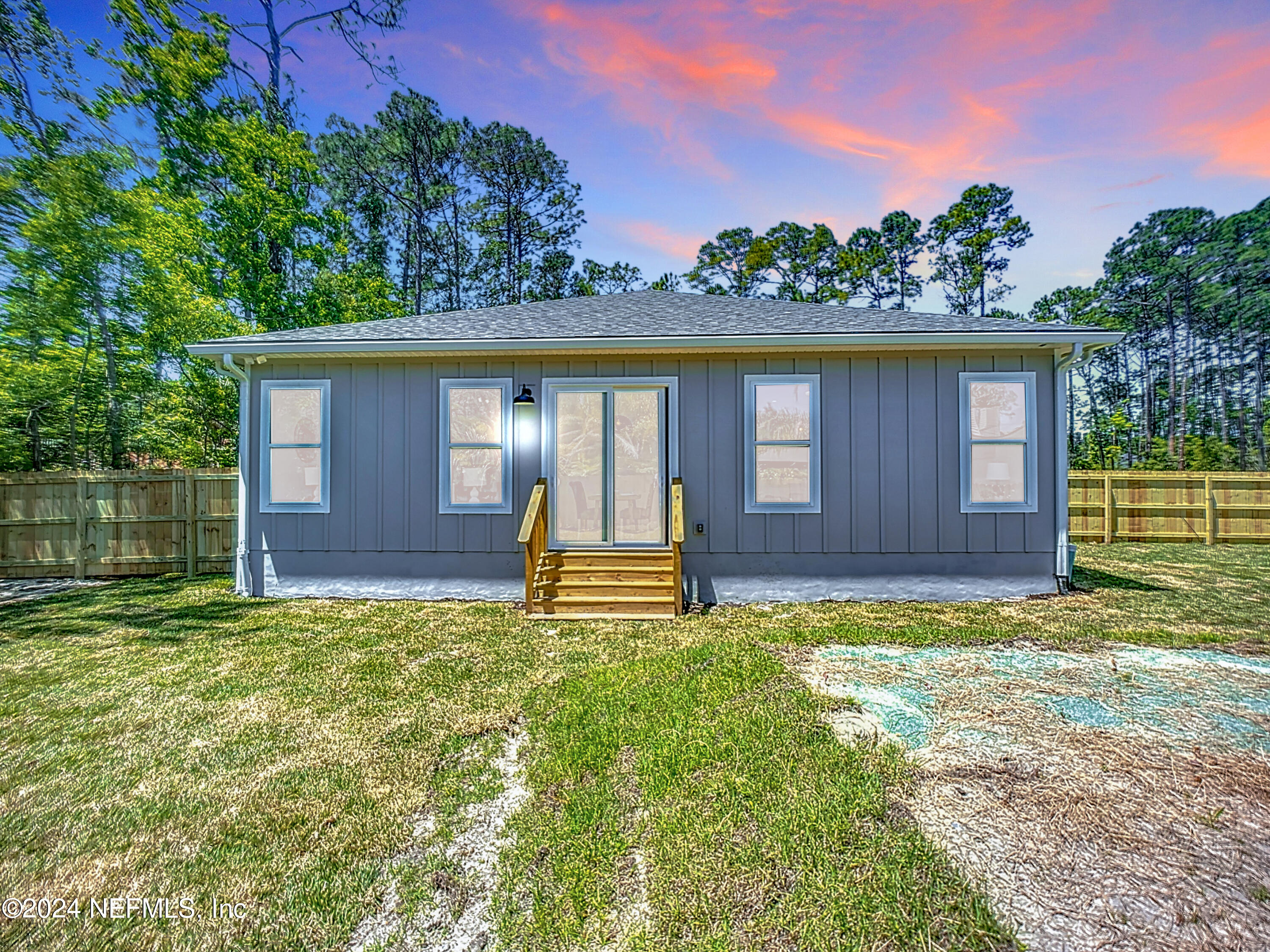 2909 Brougham Jacksonville, FL 32246 - Photo 31 of 46 a view of a house with backyard and garden