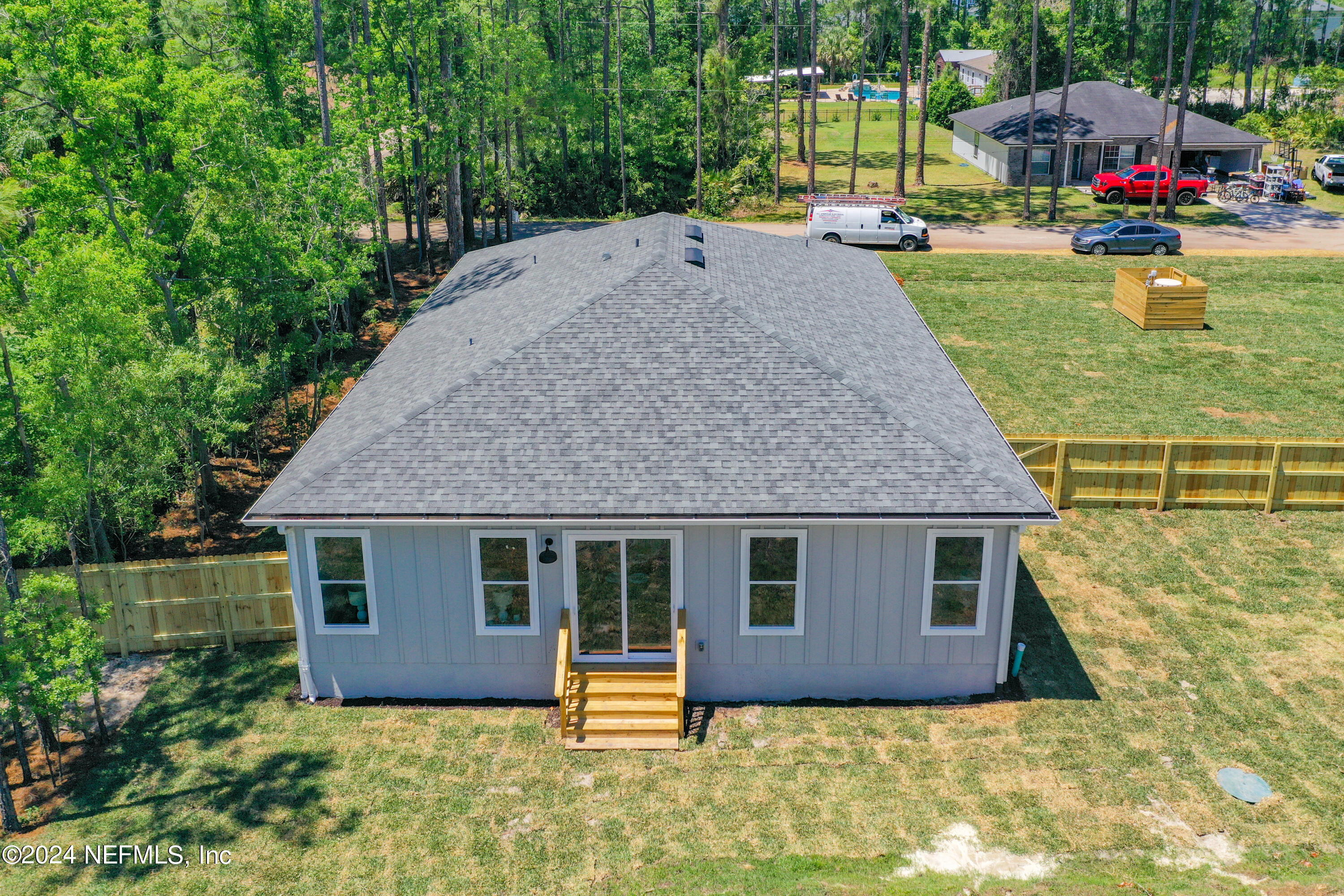 2909 Brougham Jacksonville, FL 32246 - Photo 33 of 46 a view of a house with backyard porch and garden
