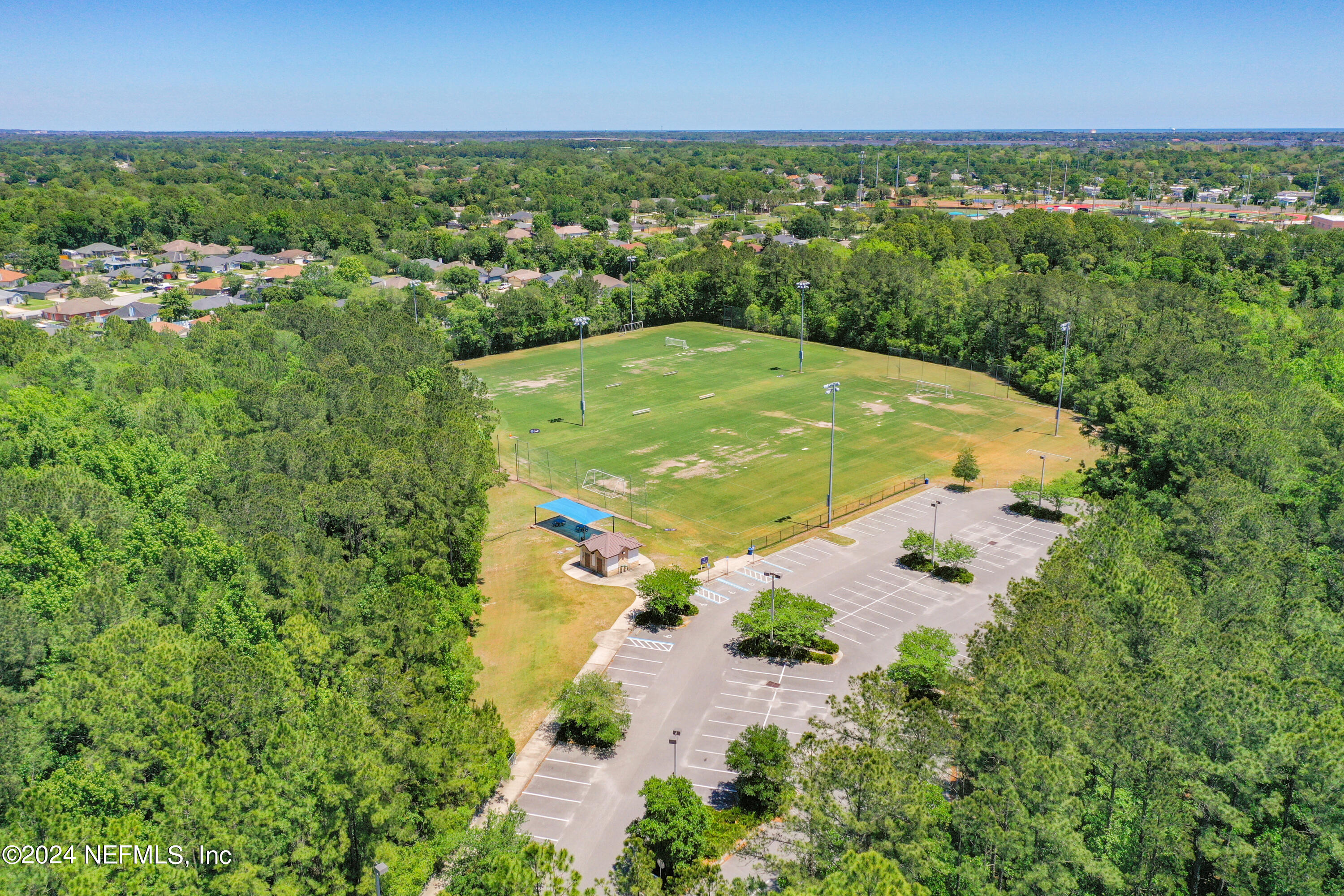 2909 Brougham Jacksonville, FL 32246 - Photo 41 of 46 an aerial view of residential houses with outdoor space and trees