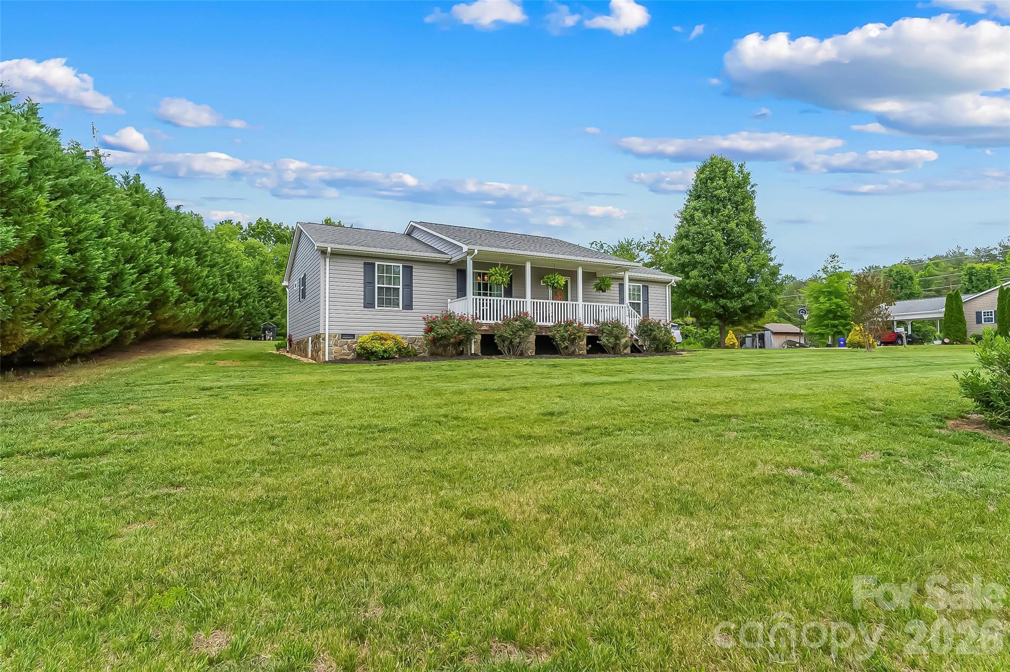 1498 Salem Road Morganton, NC 28655 - Photo 2 of 32 a view of a house with a big yard