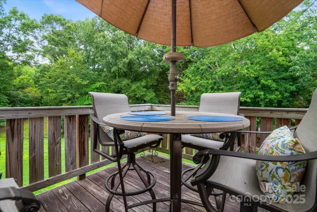 a view of an outdoor sitting area with furniture