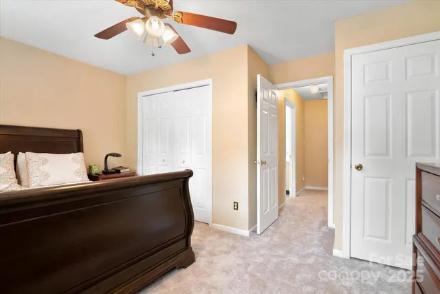 a view of a hallway to a livingroom and a fireplace
