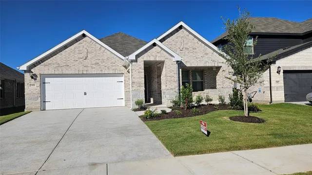 a view of a house with garden