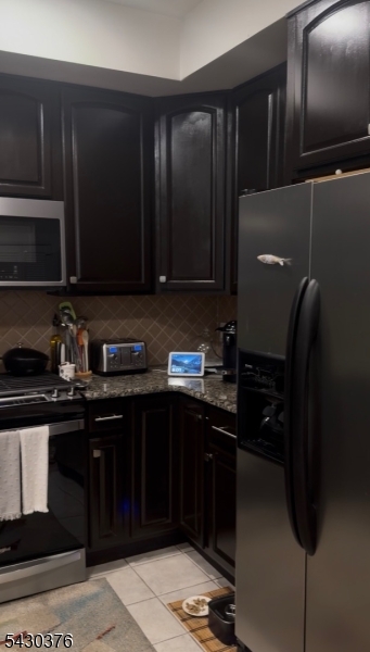 15 Tichenor Street, Unit 405 Newark, NJ 07114 - Photo 16 of 20 a kitchen with a sink and cabinets