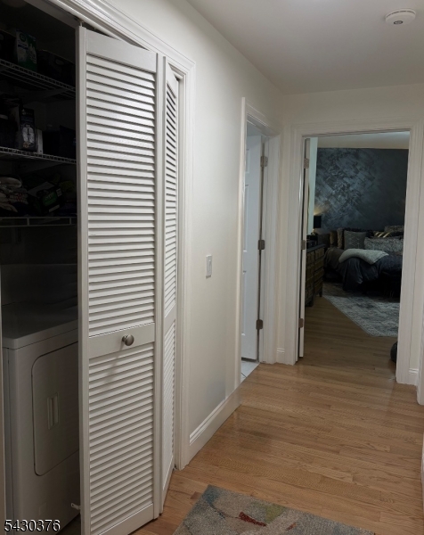 15 Tichenor Street, Unit 405 Newark, NJ 07114 - Photo 5 of 20 a view of a bedroom from the hallway