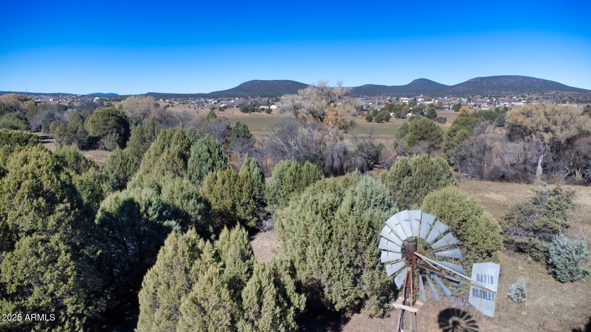 360 Barracks Road, Unit A Young, AZ 85554 - Photo 4 of 17 an aerial view of a house with a mountain