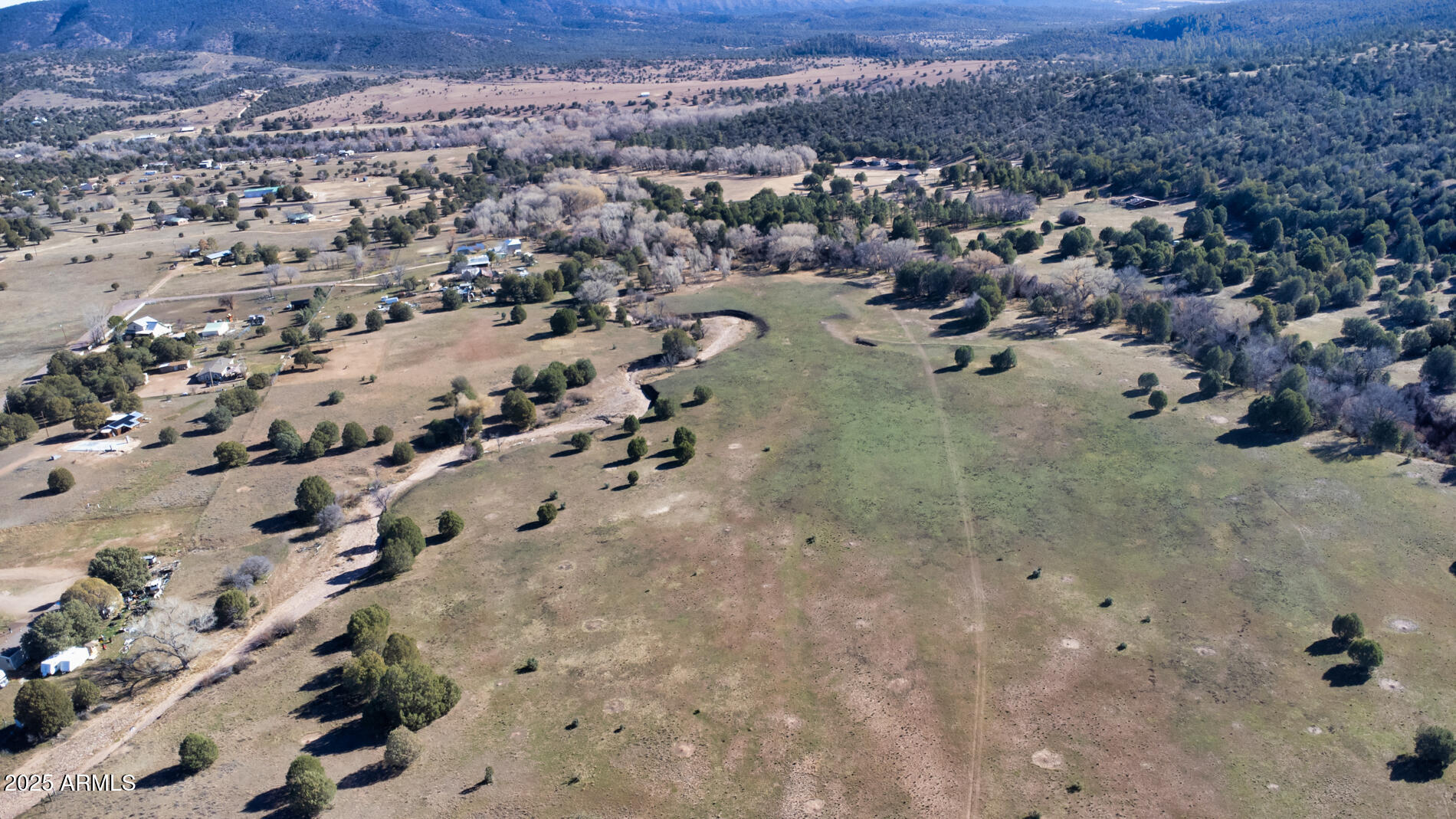 360 Barracks Road, Unit A Young, AZ 85554 - Photo 9 of 17 an aerial view of a house with a yard